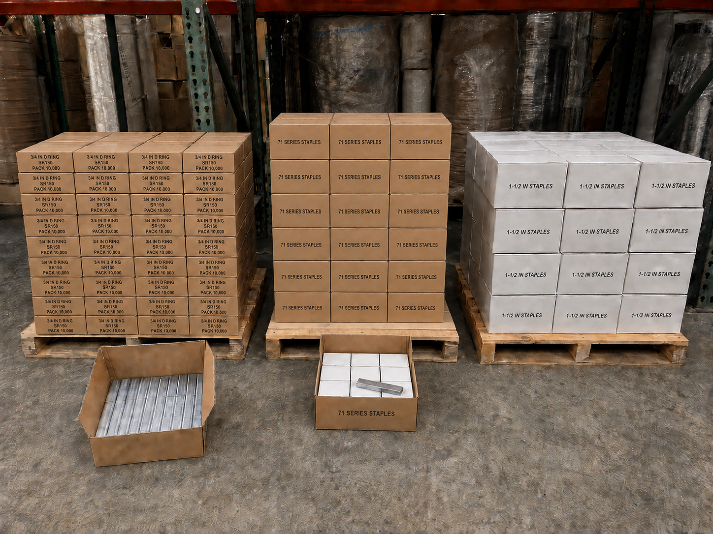 Full pallets of hog rings, 71-series staples, and 1½-inch staples in warehouse inventory.